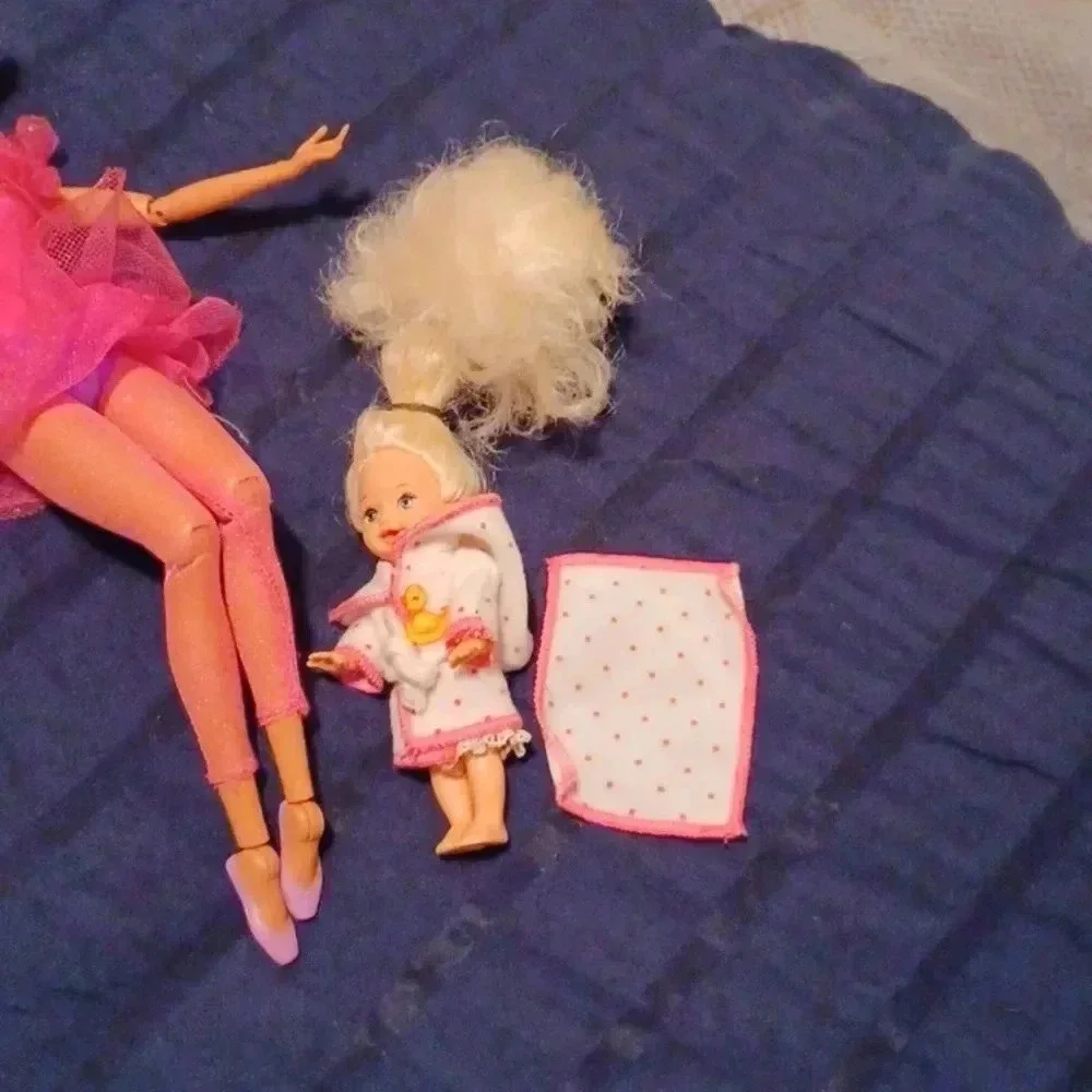 2 vintage Mattel Barbie dolls , one  Ken and one mini with extras